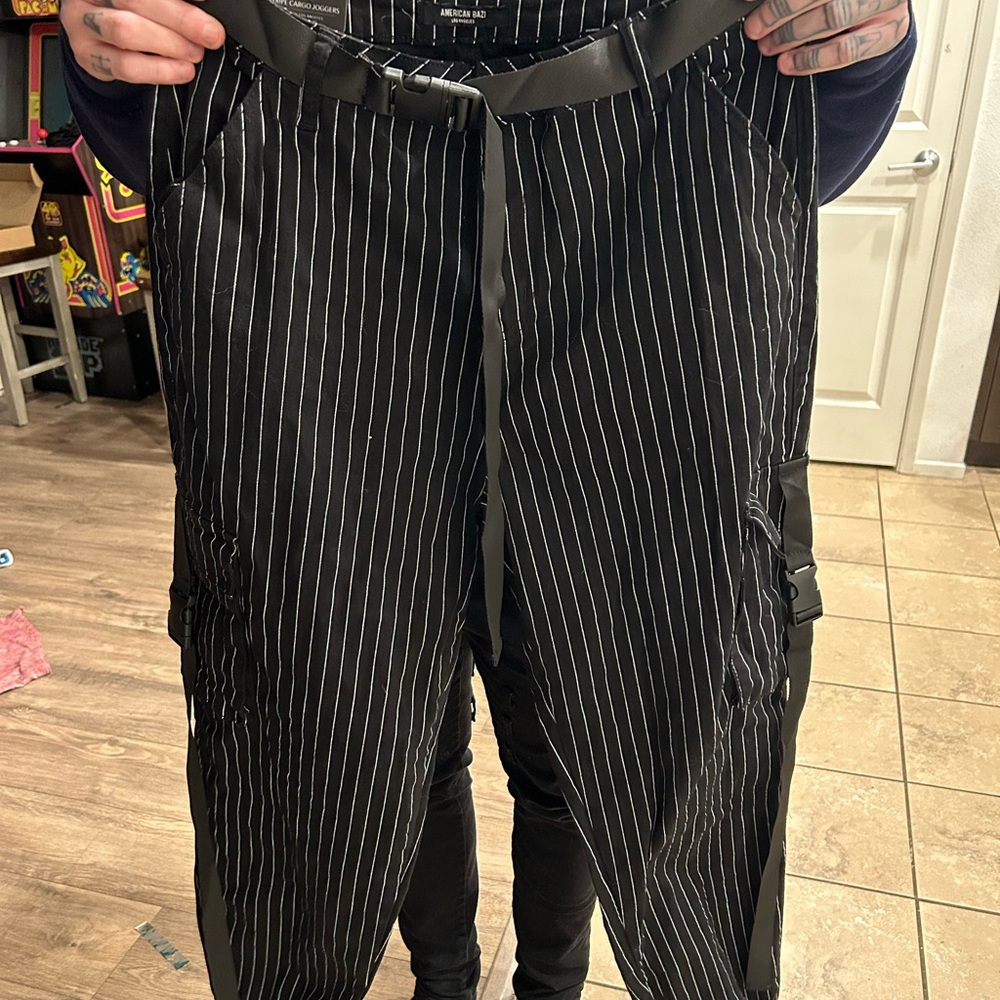 Forever 21 pinstripe belted cargo pants. Never worn. Size large.